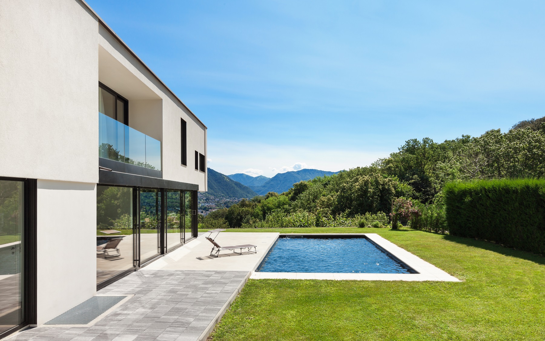 Modern villa with pool, view from the garden